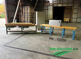 Various workshop tables and tool cabinets