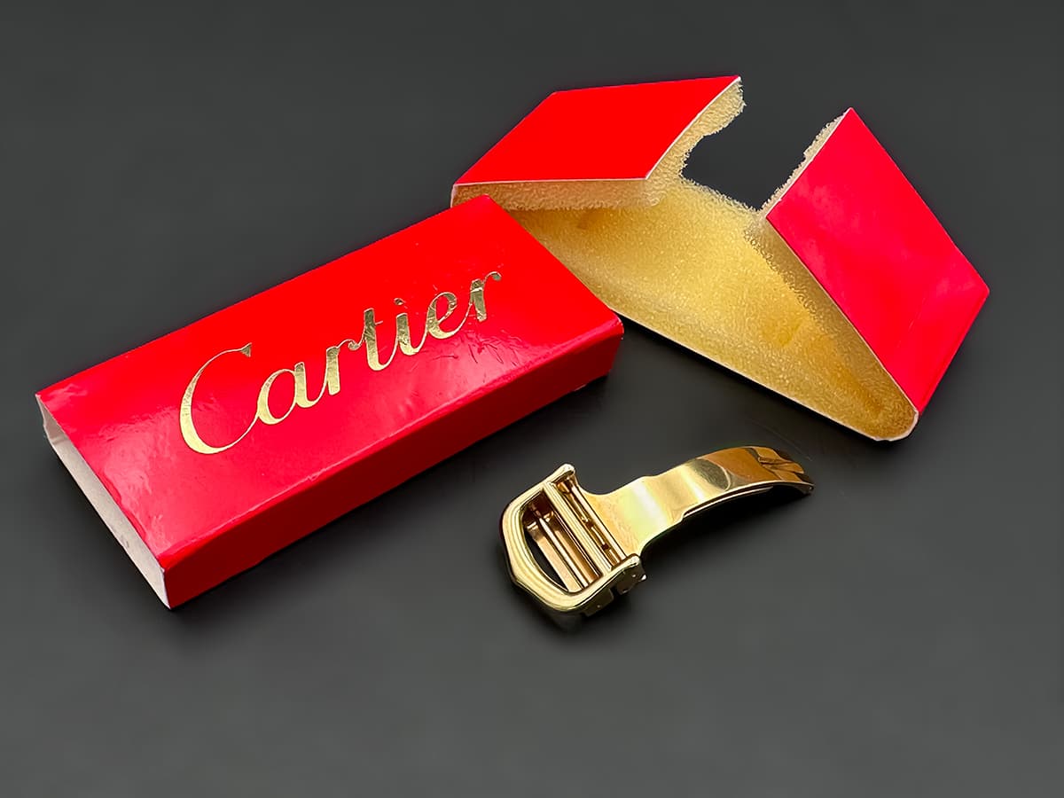 Cartier+Faltschließe,+vergoldet,+inkl.+Etui,+ungenutzt