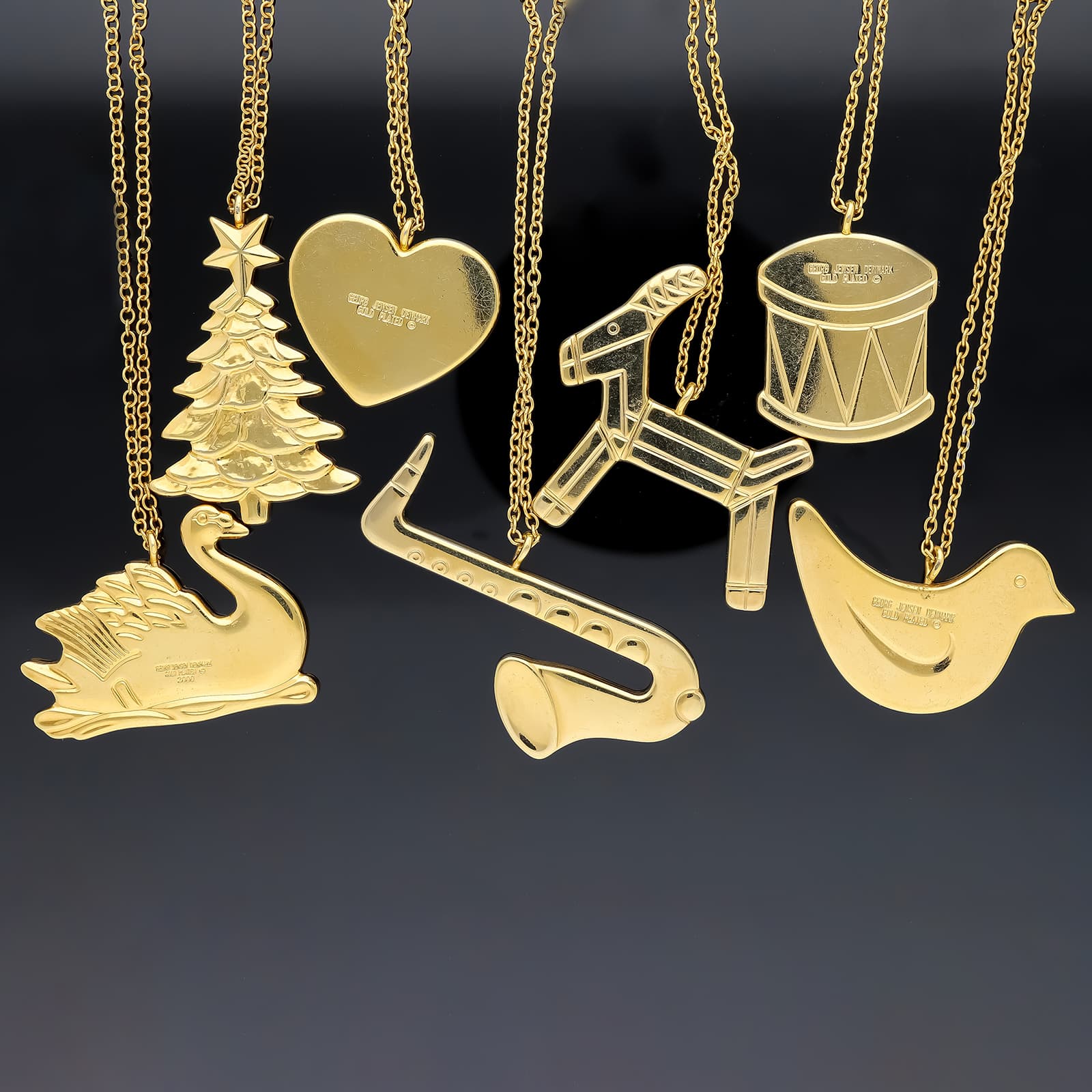 Georg+Jensen,+Dänemark,+um+1985–1995.+Sieben+Weihnachtsschmuck+Anhänger