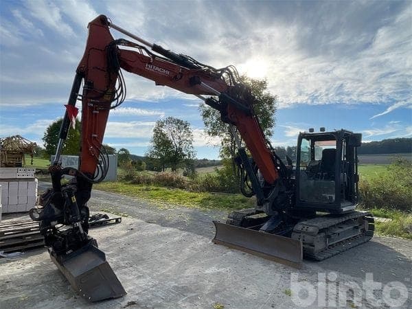Hitachi ZX85USB-6 compact excavator with trench spoon set and gripper (2022)