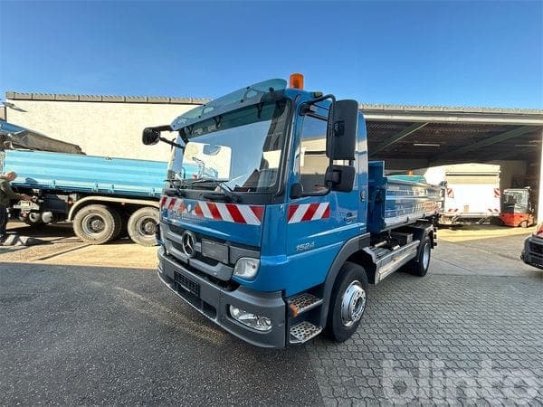 Mercedes-Benz Atego 1524 4x2 tri-side tipper truck (2011)