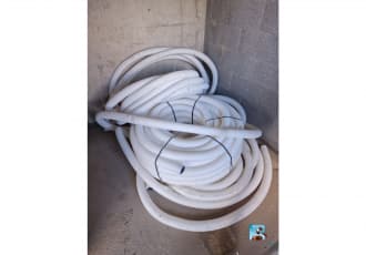 coils of flexible ventilation ducting