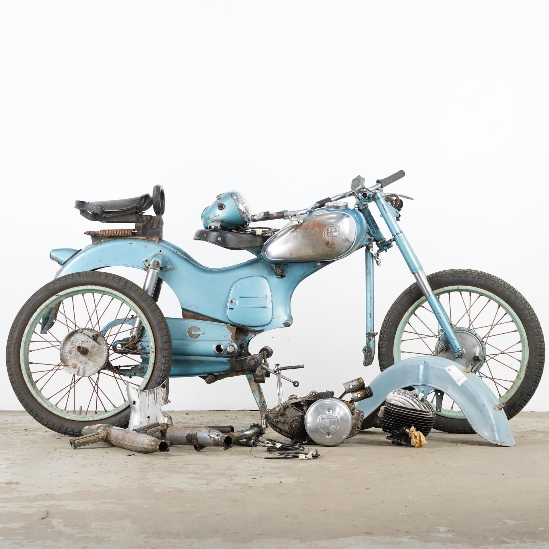 PUCH, 150TL, motorcycle in parts, 1951.