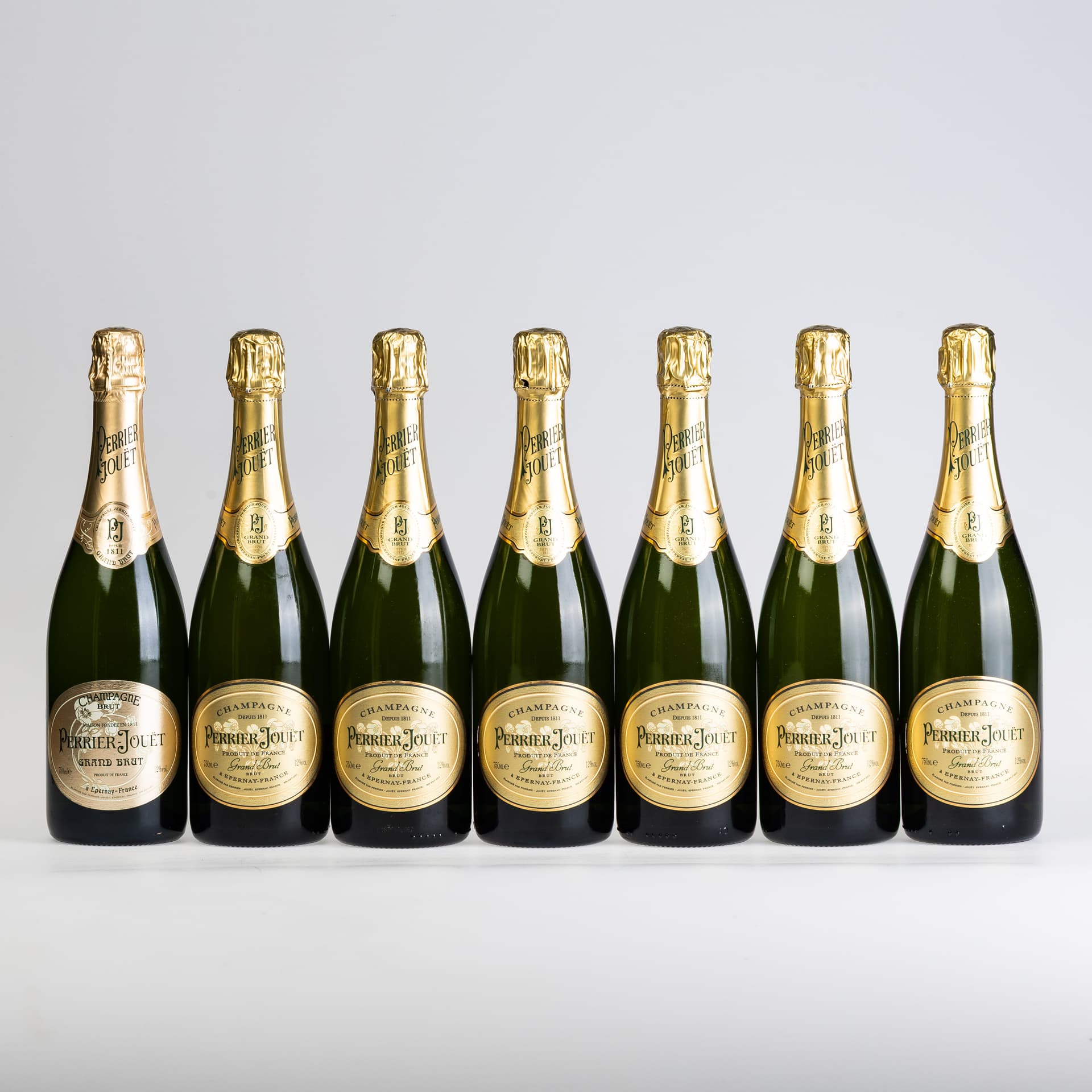 SEVEN BOTTLES OF PERRIER JOUËT GRAND BRUT CHAMPAGNE.