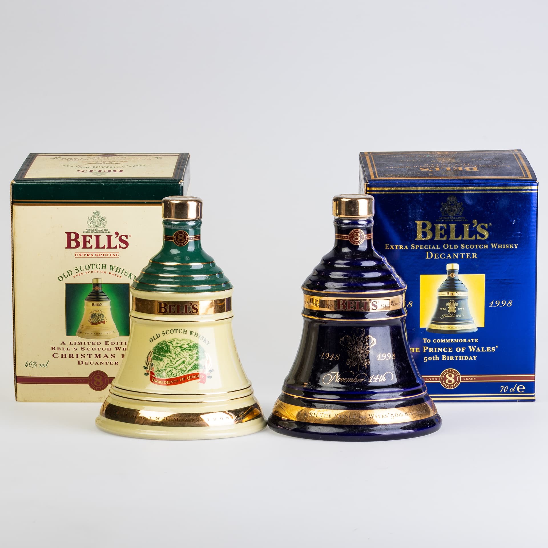 PAIR OF COMMEMORATIVE BELL'S OLD SCOTCH WHISKYS.
