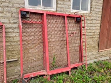 Front frame for load exchanger with lamps and ladder