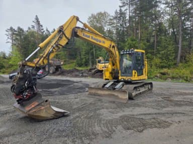 Komatsu 138US 2022 with Novatron GPS R4 Rototilt Skjær