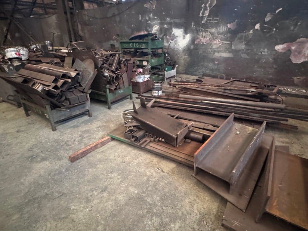 Forklift with spade, paint and plaster mixers, computer