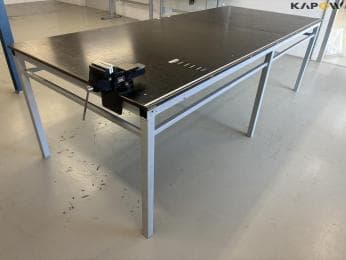 Heavy duty workbench with clamp