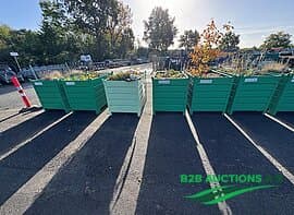 5 steel planters with plants