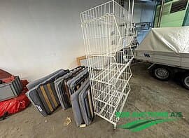 4 folding beds and a grid shelf