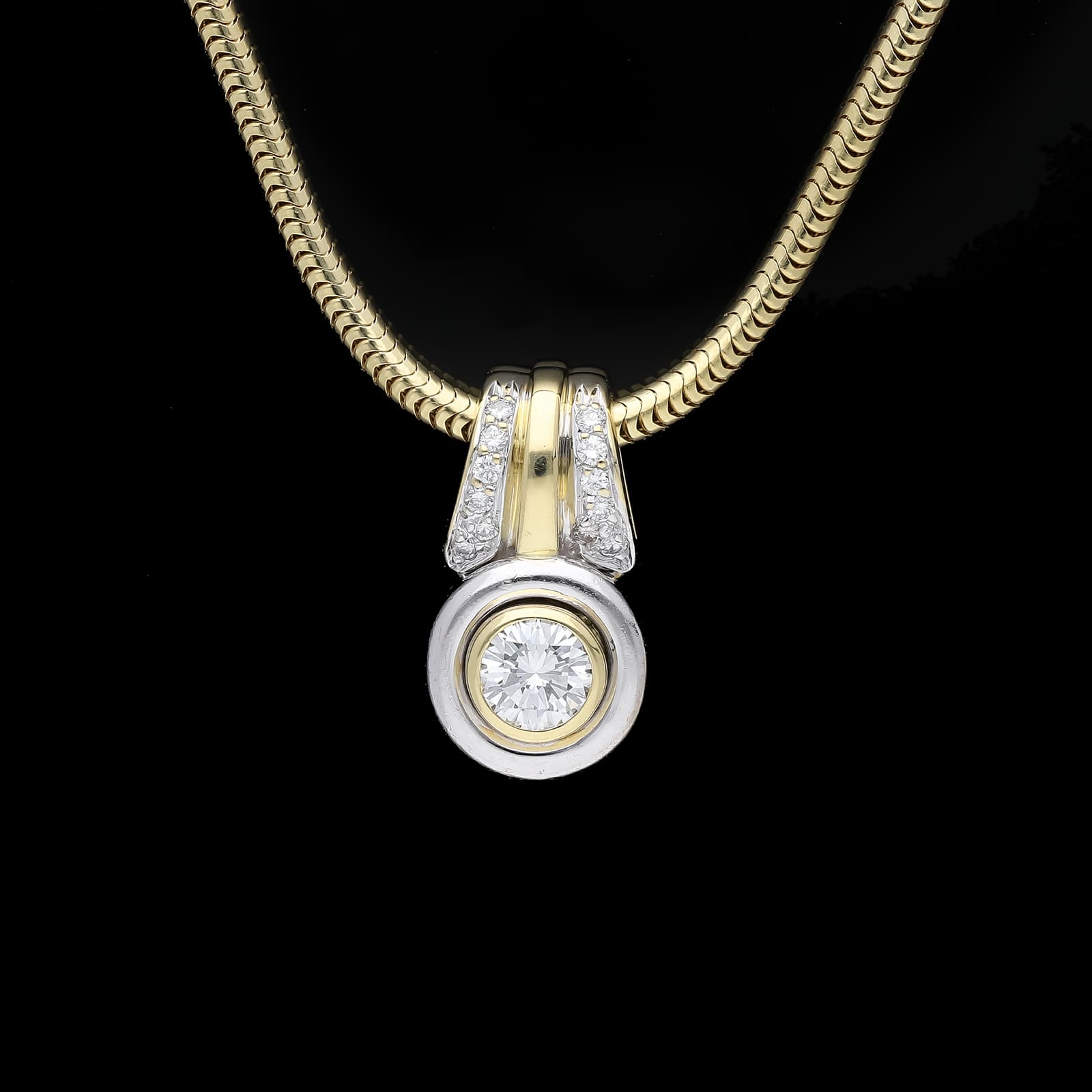Christ+Halskette+mit+Anhänger+0,78+ct.+Diamant,+Diamanten+750+Gelbgold+18+kt.+IGI+Zertifikat