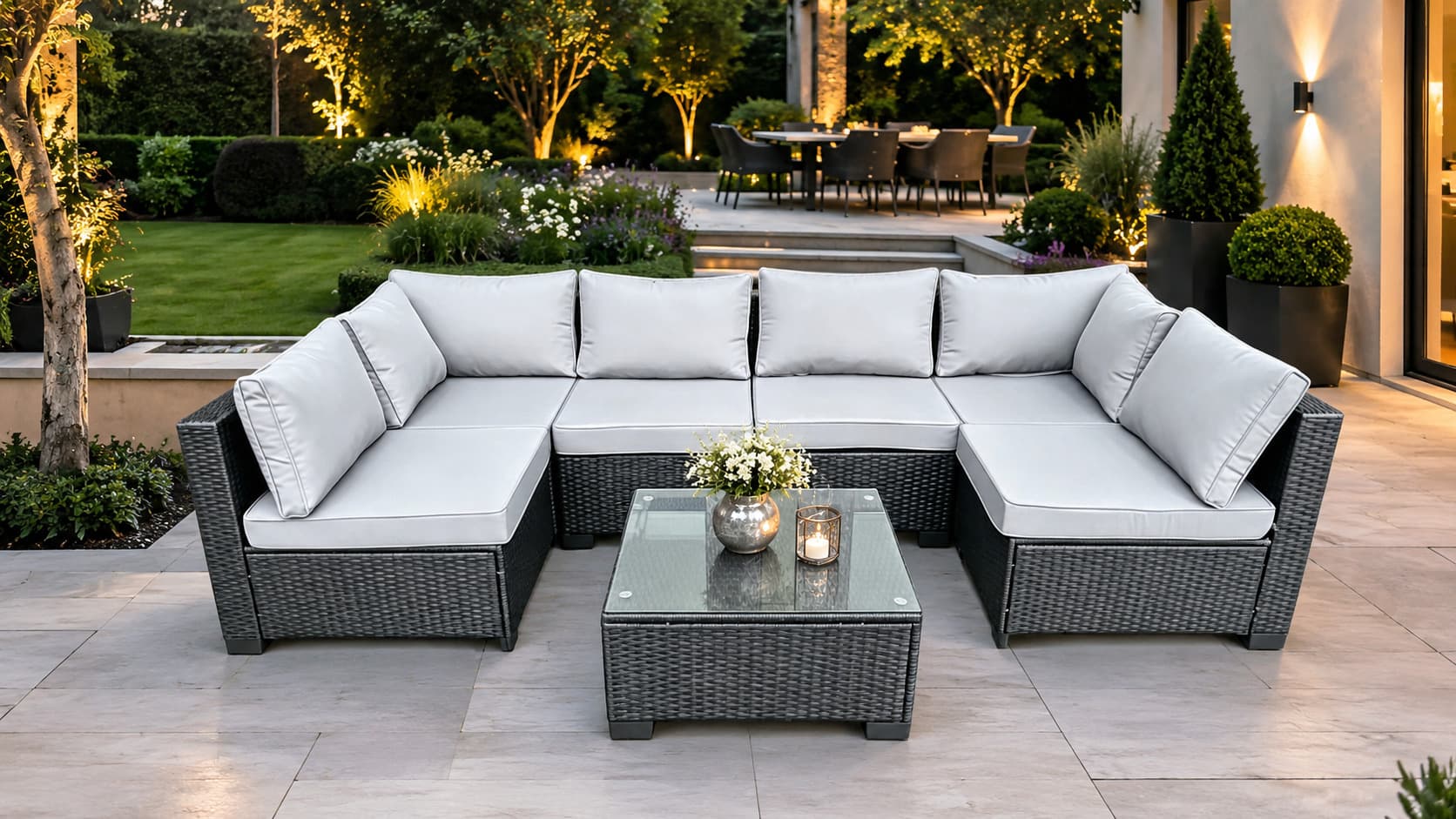New & Boxed Ariella Luxury 6-Seater Rattan Garden Set with Glass-Top Table RRP: £1,499. Transform