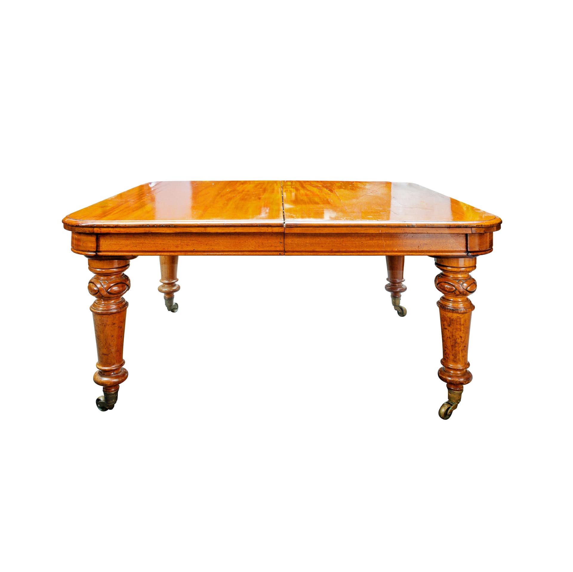 A Victorian mahogany wind out extending dining table by Henry Ogden 19th century