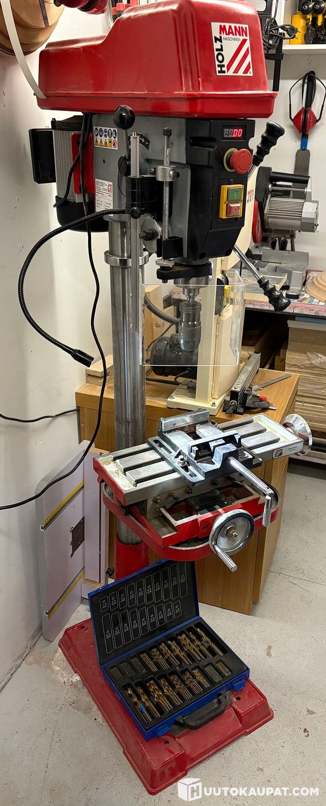 HolsMann column drill with cross-feed table and screw press