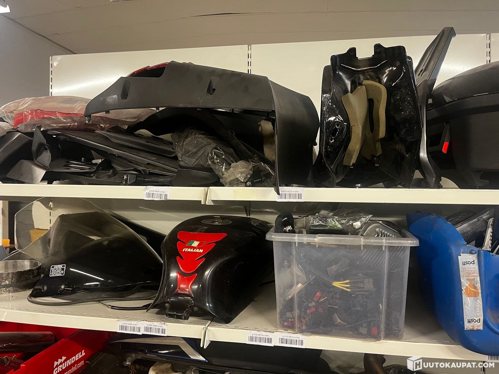Large pile of motorcycle and ATV parts, Ylivieska
