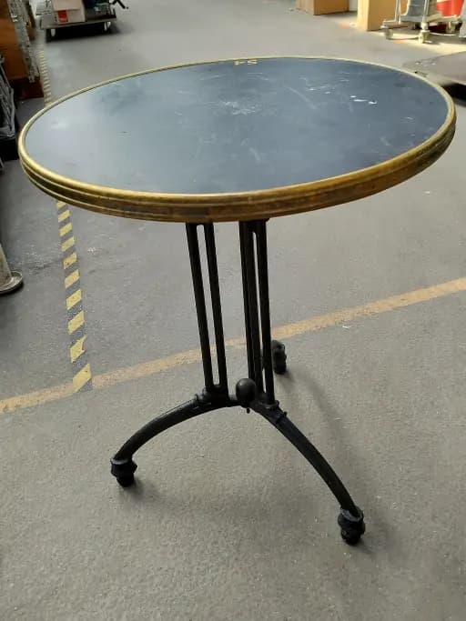 Round café table with metal frame