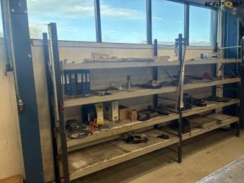 Steel shelving containing by weight: