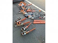 Battery-powered motor-sense , hedge cutter and engine carrier as spare part carrier