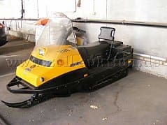 Bombardier snowmobile with trailer