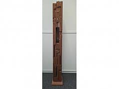 Brutalist clock made of carved solid wood
