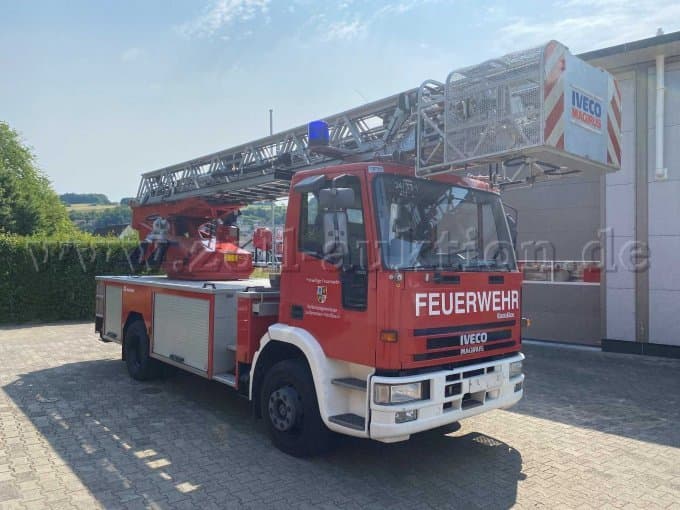 Magirus DLK 18-12 CC rotating ladder on IVECO chassis