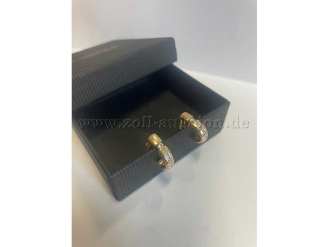 Pair of 585 gold earrings set with diamonds
