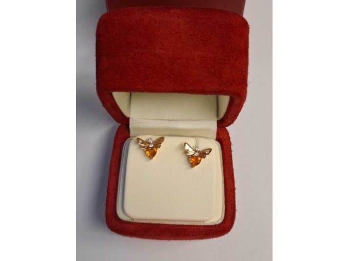 Pair of Stud Earrings *** 18 Karat Rose Gold *** with Setting Three Small Diamonds ** Wempe