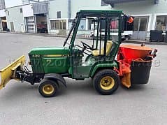 Tractor John Deere 430 with snow shield and spreader